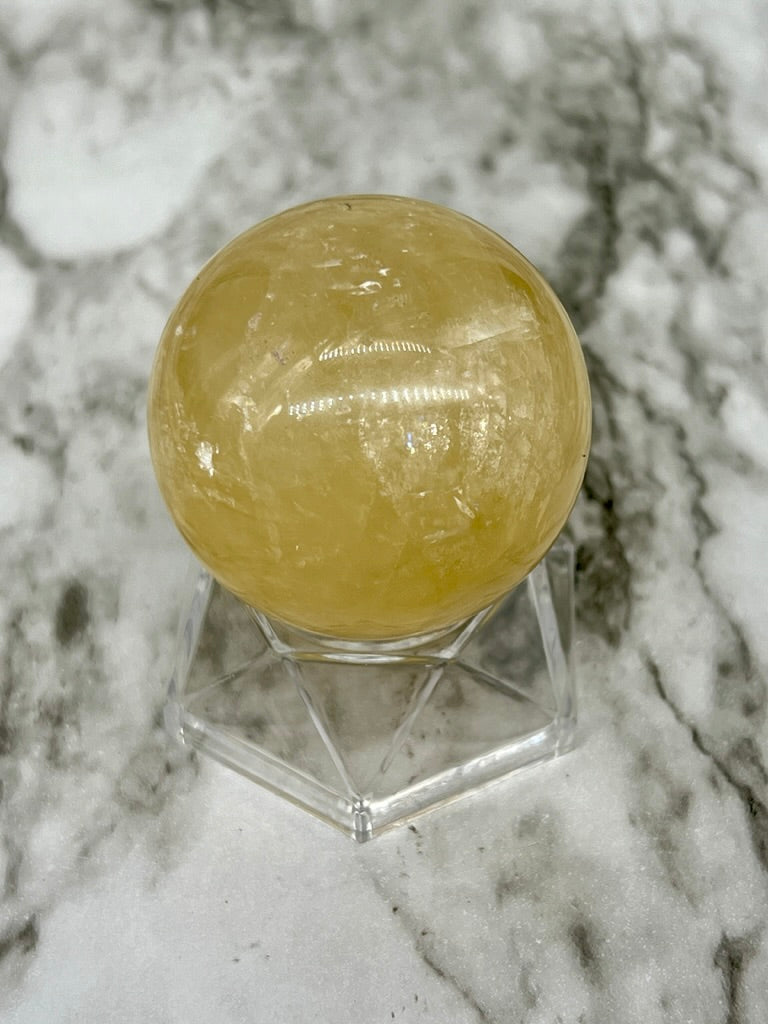 Honey Calcite Sphere π Rainbow Inclusions
