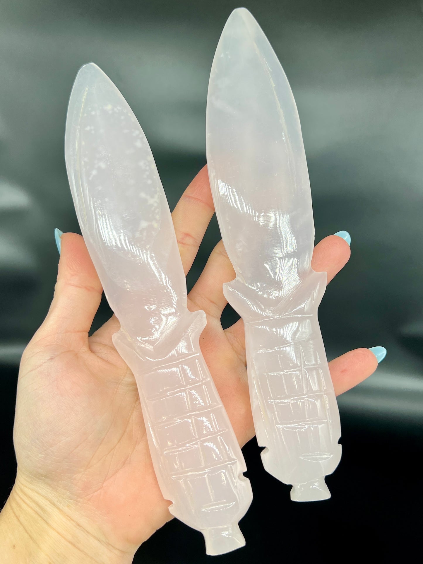 Pink Mangano Dagger Carving