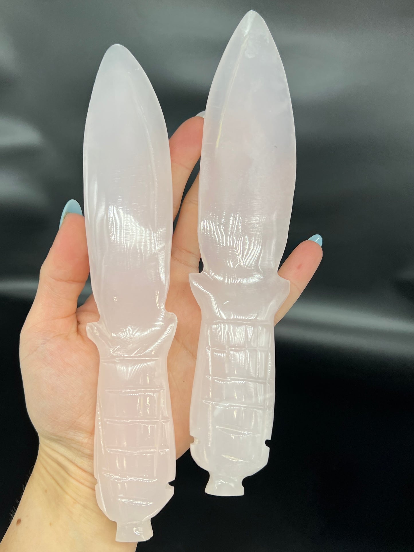 Pink Mangano Dagger Carving