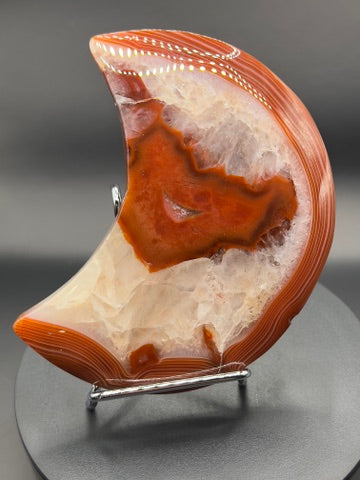Carnelian Moon Carving with Rainbow Inclusions