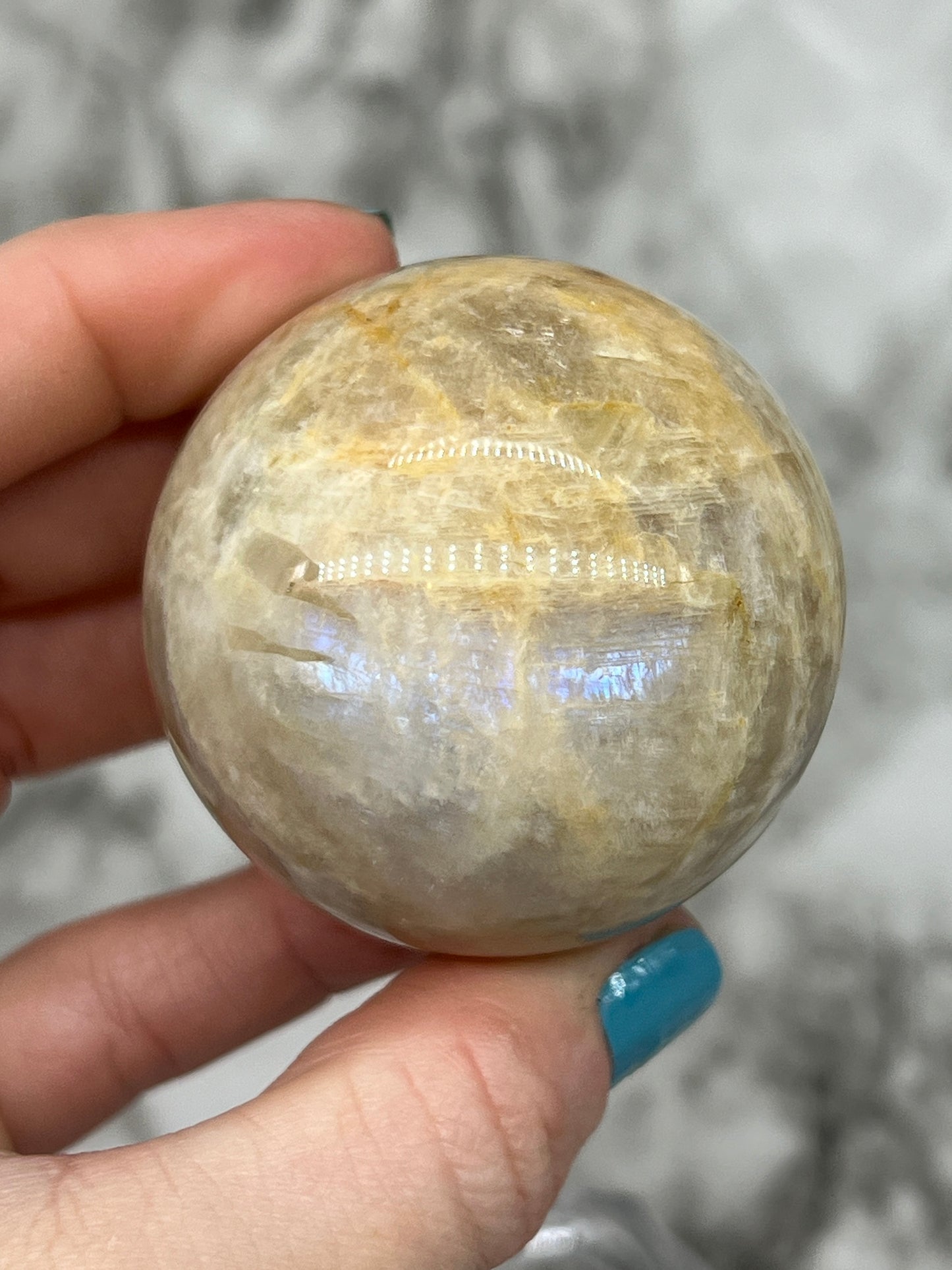 Flashy Peach Moonstone Sphere with Blue Flash