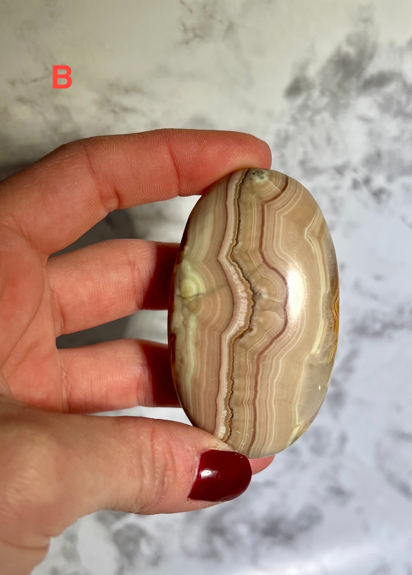 Pink Banded Onyx Palm Stone