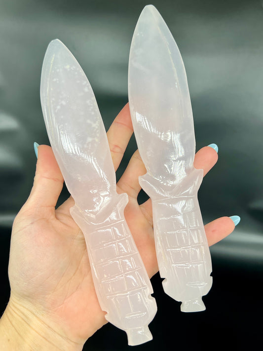 Pink Mangano Dagger Carving